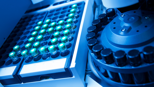Automated laboratory system with rows of vials for therapeutics research